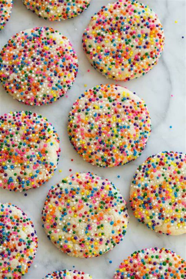 Sprinkle Cookies on a baking sheet.
